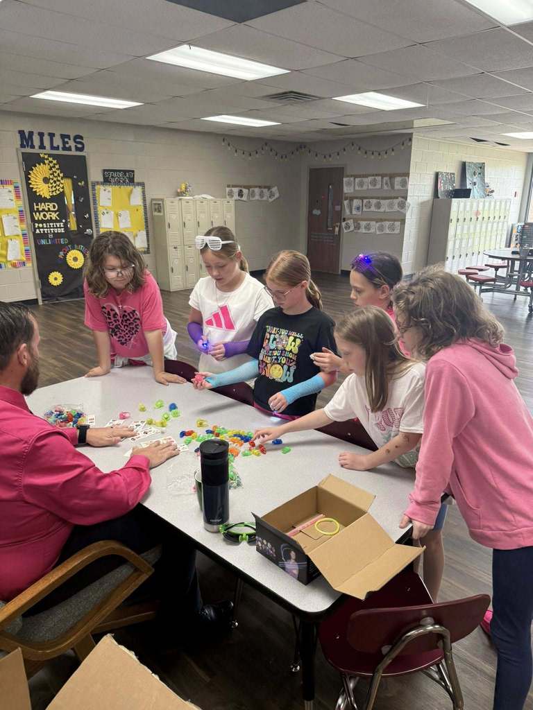 students preparing for the glow party