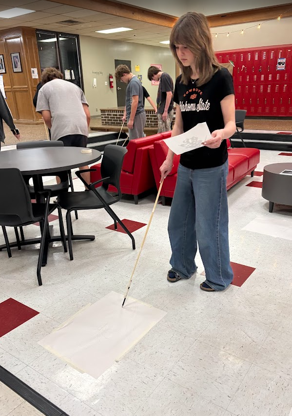 We tried something a little different in the art room 🎨  Students were challenged to create drawings using pencils attached to long sticks instead of holding them in their hands. With that added distance, every line became less about precision and more about movement, gesture, and trusting the process.  It started off feeling awkward (and a little frustrating), but that’s where the magic happens. When perfection isn’t possible, creativity takes over. Students loosened up, took risks, and embraced the “mess”—and the results were incredible. 👏