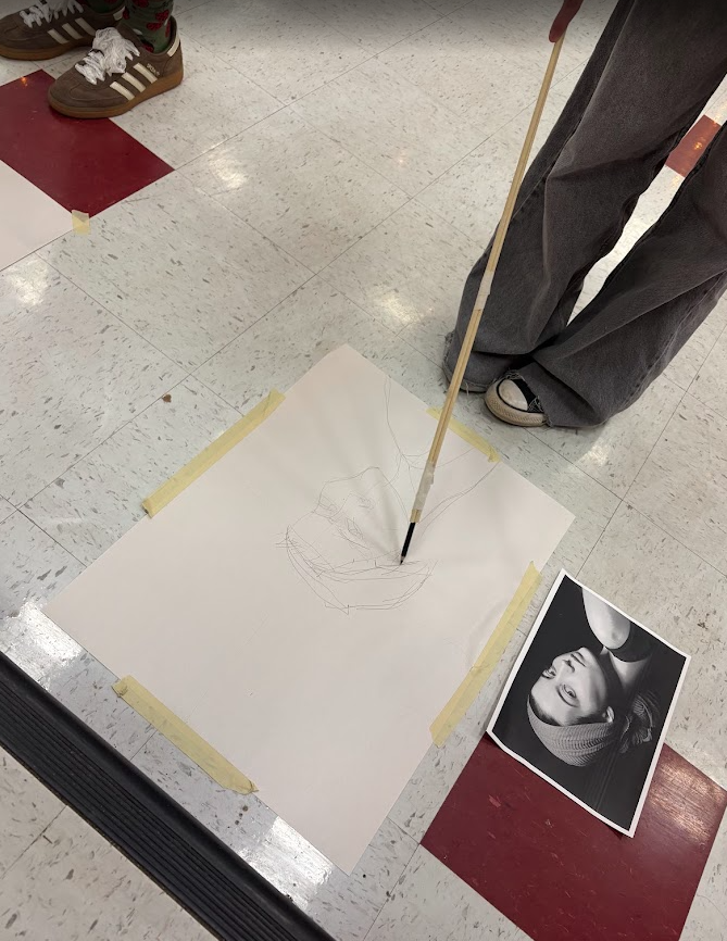 We tried something a little different in the art room 🎨  Students were challenged to create drawings using pencils attached to long sticks instead of holding them in their hands. With that added distance, every line became less about precision and more about movement, gesture, and trusting the process.  It started off feeling awkward (and a little frustrating), but that’s where the magic happens. When perfection isn’t possible, creativity takes over. Students loosened up, took risks, and embraced the “mess”—and the results were incredible. 👏