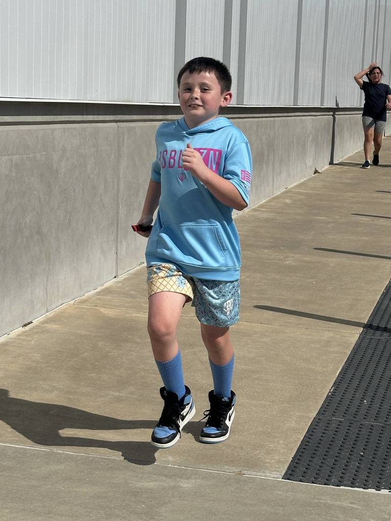 students running at running club