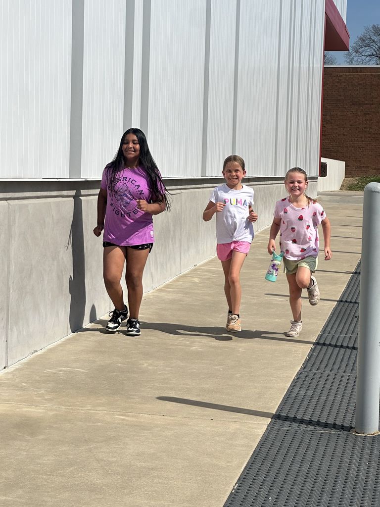 students running at running club