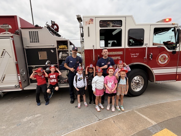 Students with Claremore Firefighters