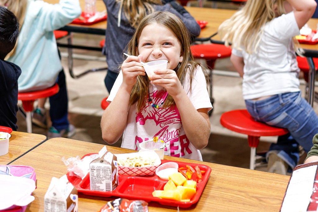 Claremont student trying pumpkin apple sauce