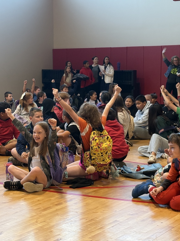 students cheering at the winner of the attendance madness