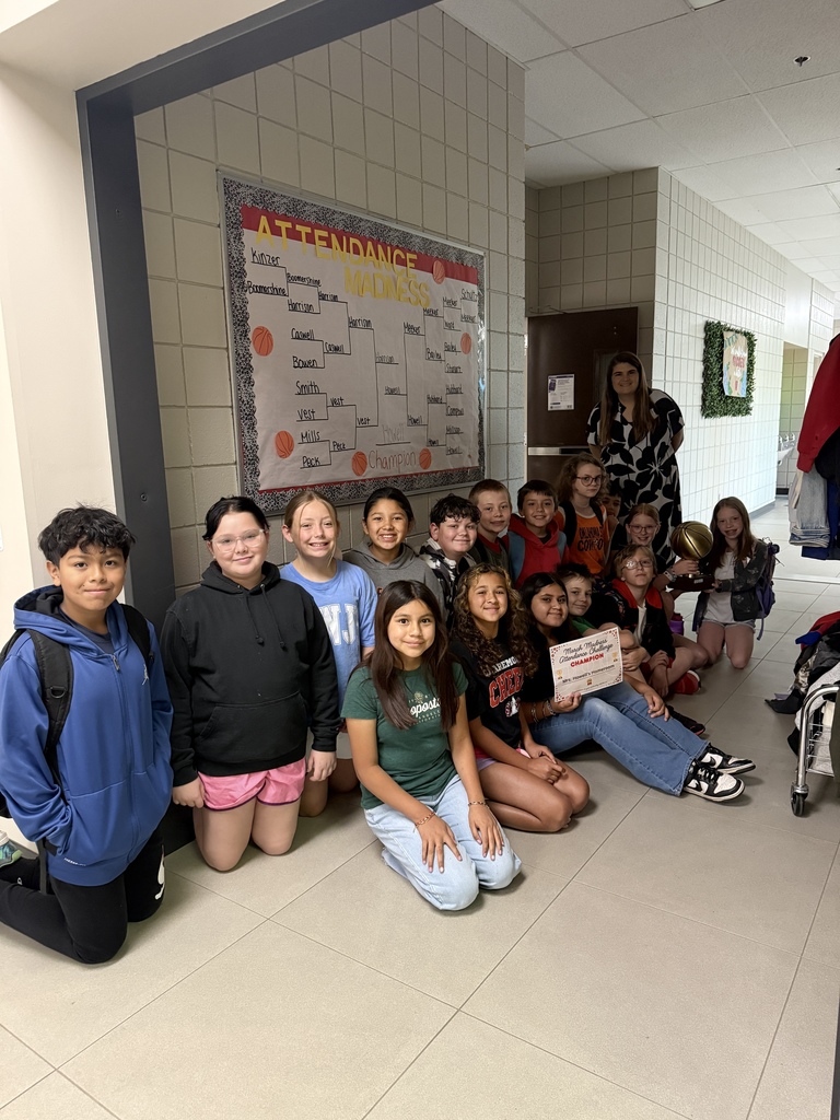 mrs howells class smiling  because they won the attendance madness