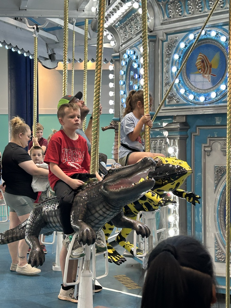 students on carousel 