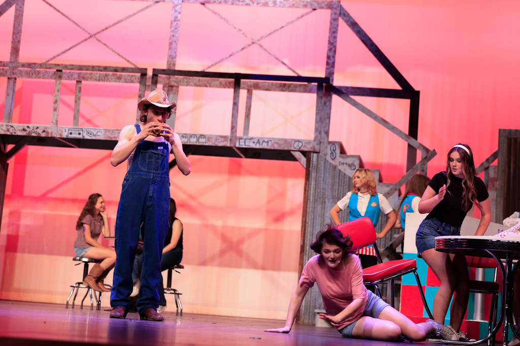 High school students performing Footloose.