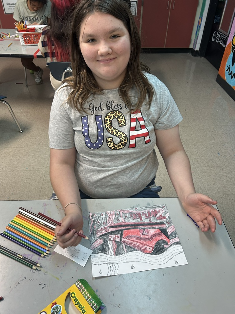 student showing art off 