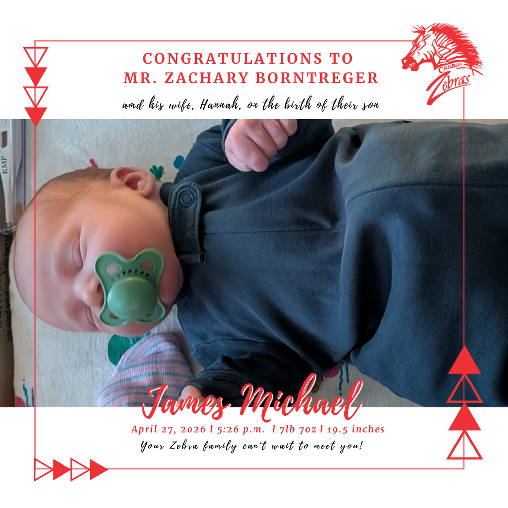 baby in blue onesie with a pacifier 