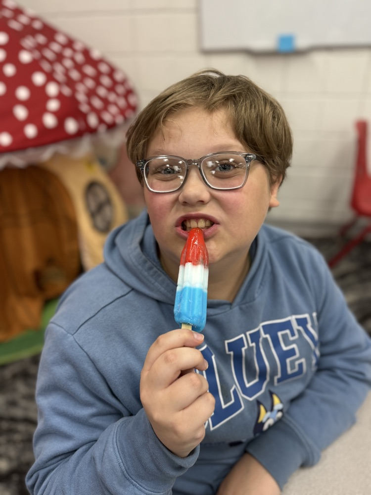 student with popsicle 