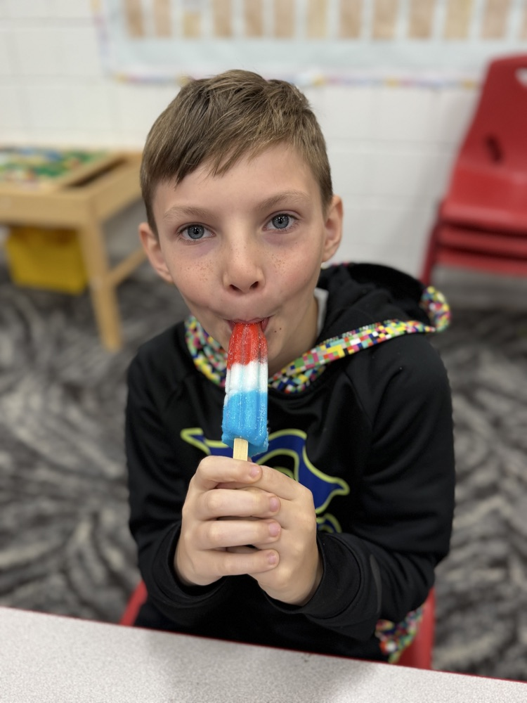 student with popsicle 