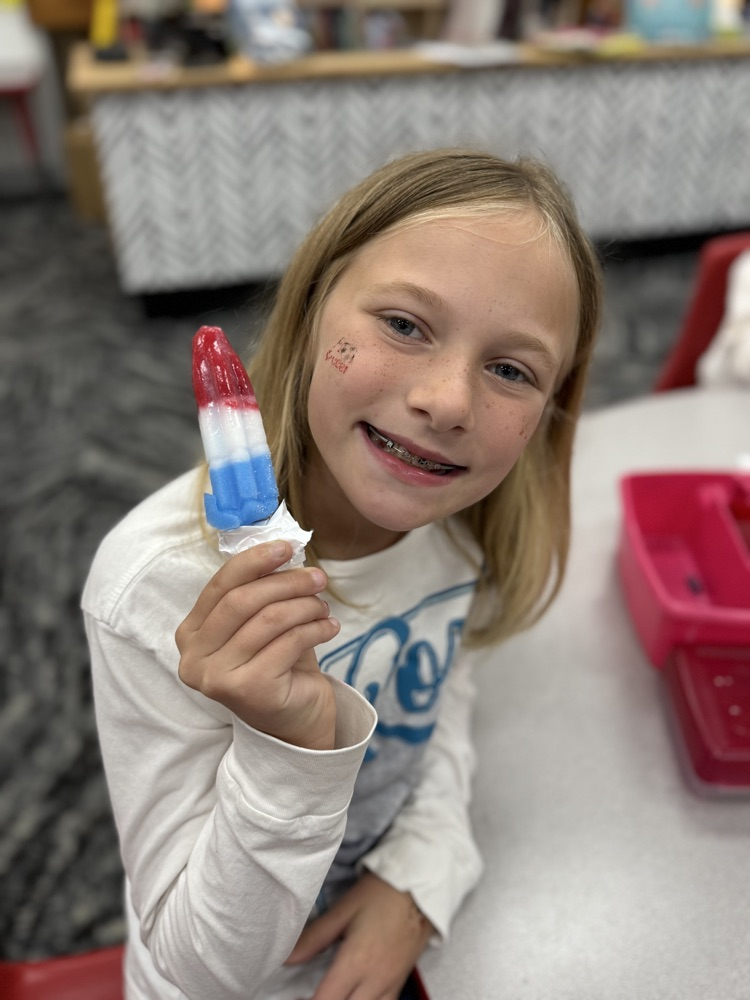 student with popsicle 