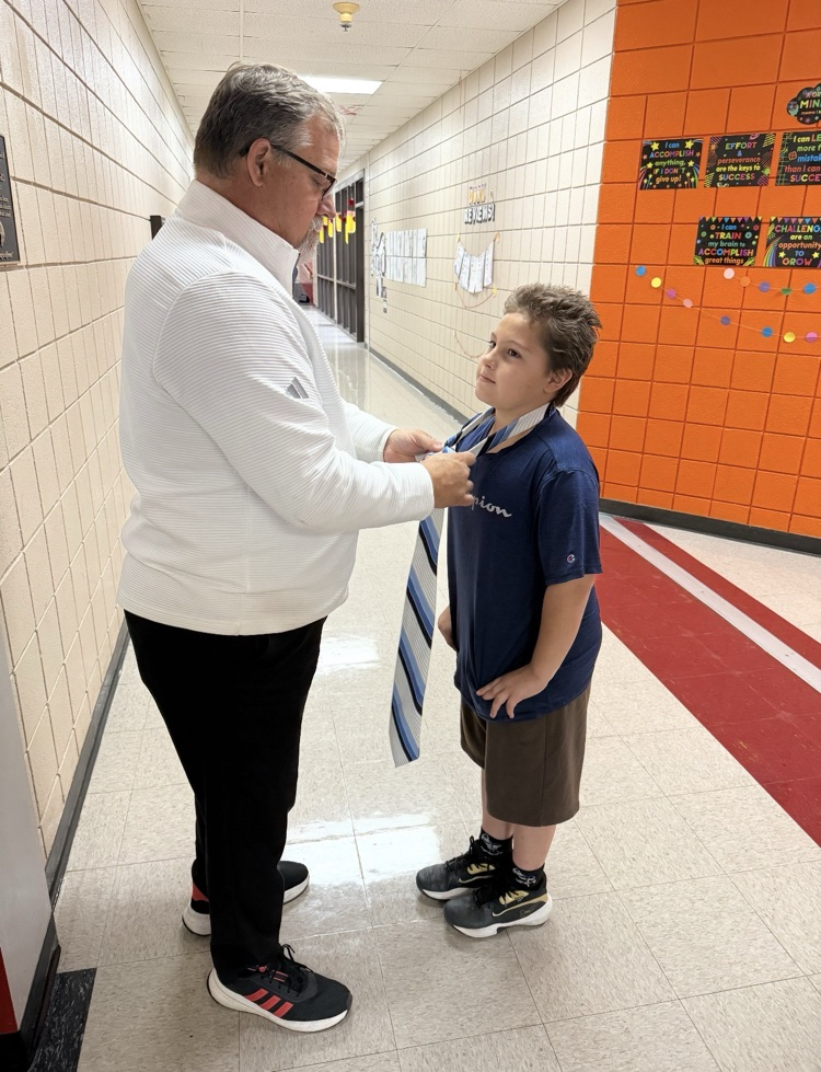 Mr Grisham helping student 
