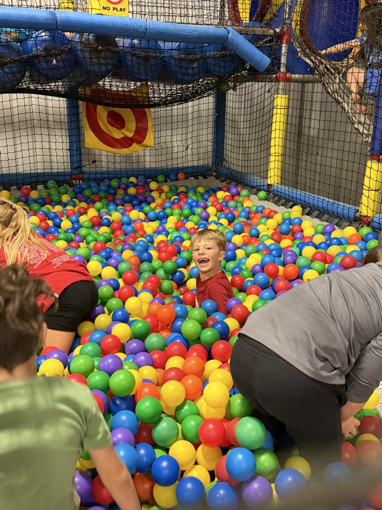 student in foam pit