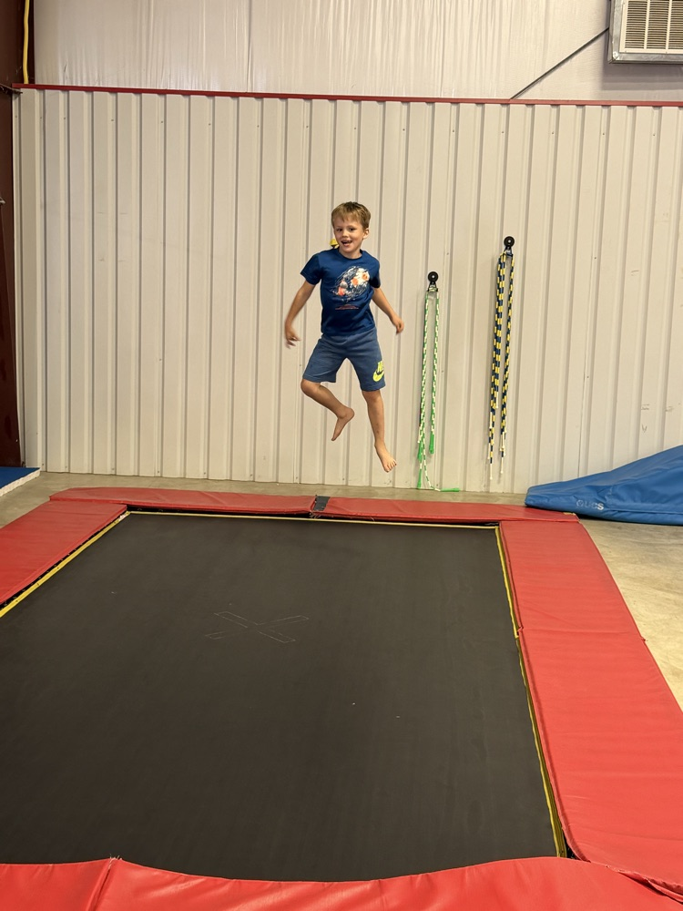 student on trampoline