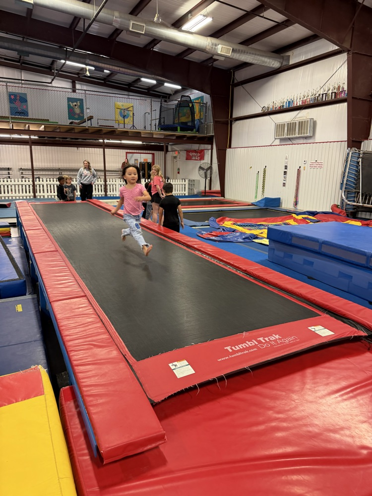 student on trampoline