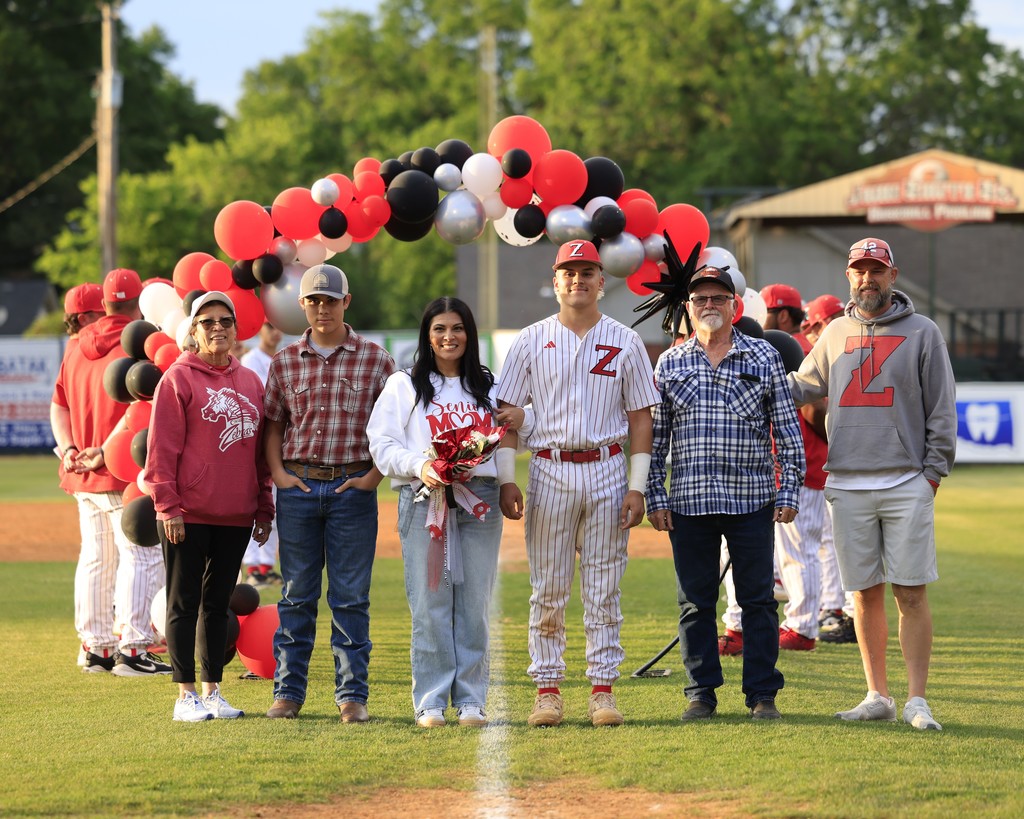 senior night baseball player and family 