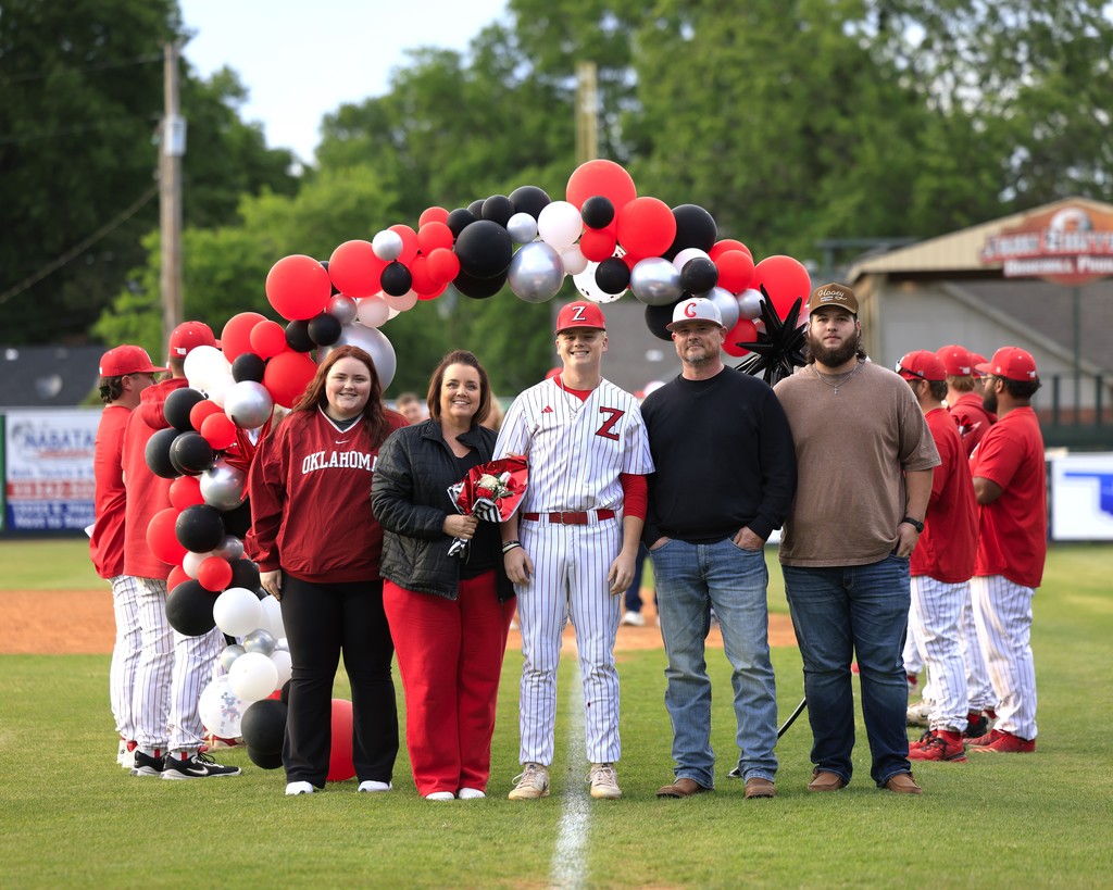 senior night baseball player and family 