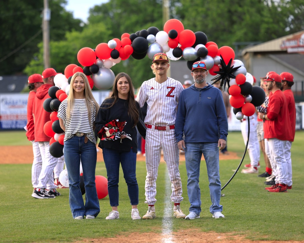 senior night baseball player and family 