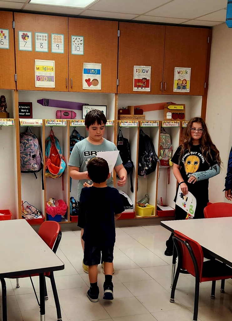 5th graders celebrating kindergarteners 