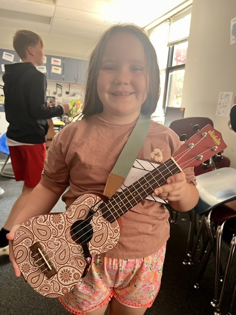 Taylor teaching music