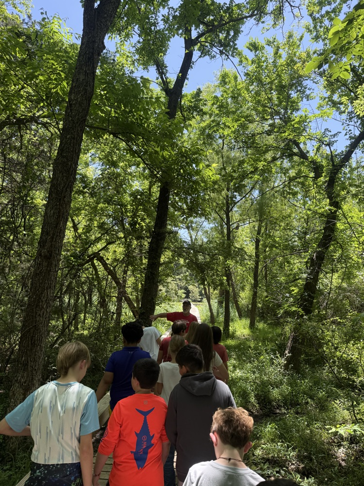 students walking trail 