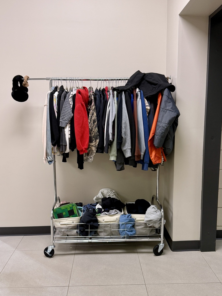 photo of the lost and found loaded down with a bunch of items