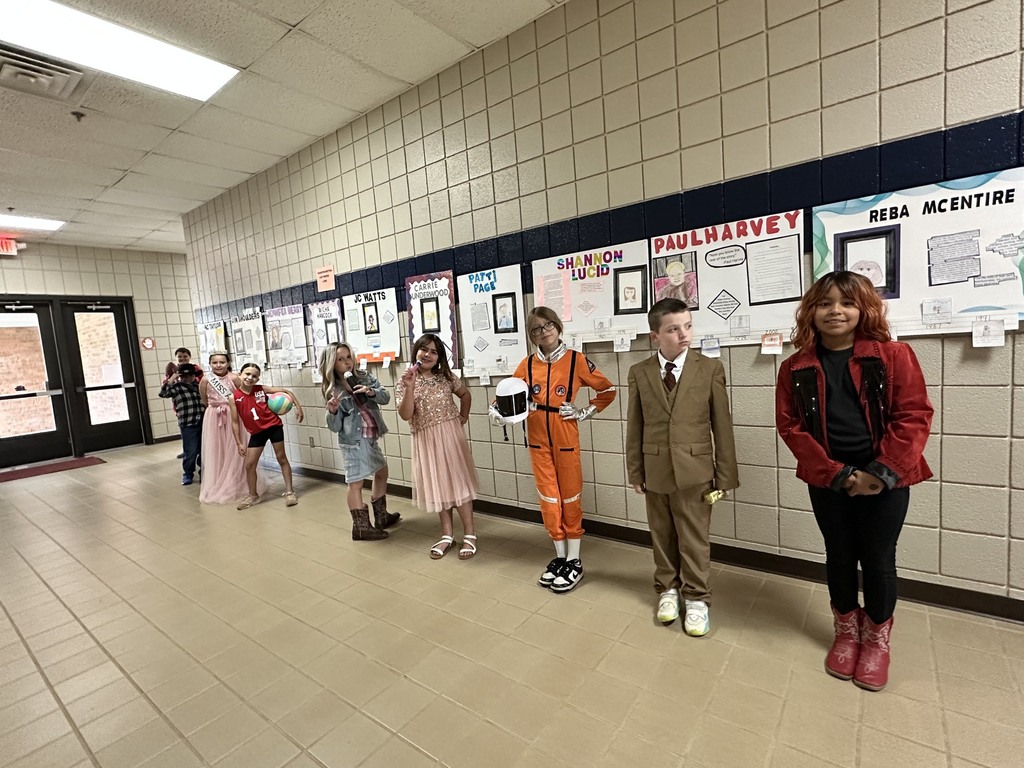 Students presenting for the wax museum