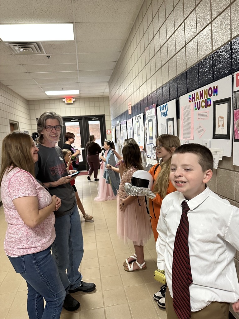 Students presenting for the wax museum