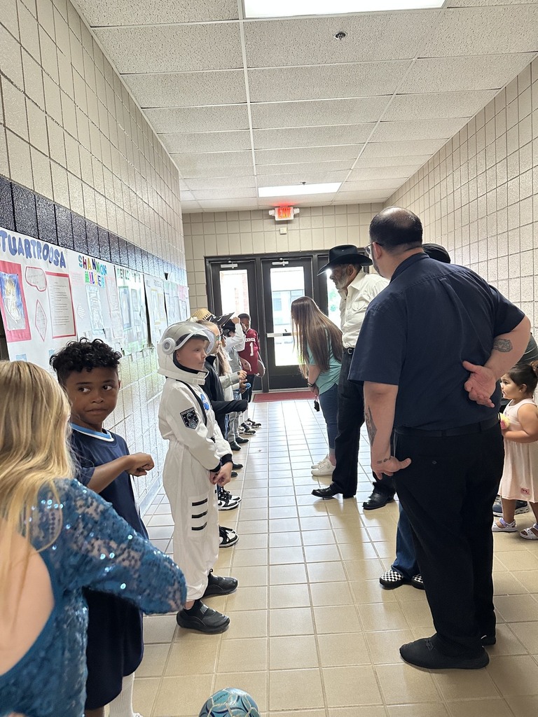 Students presenting for the wax museum