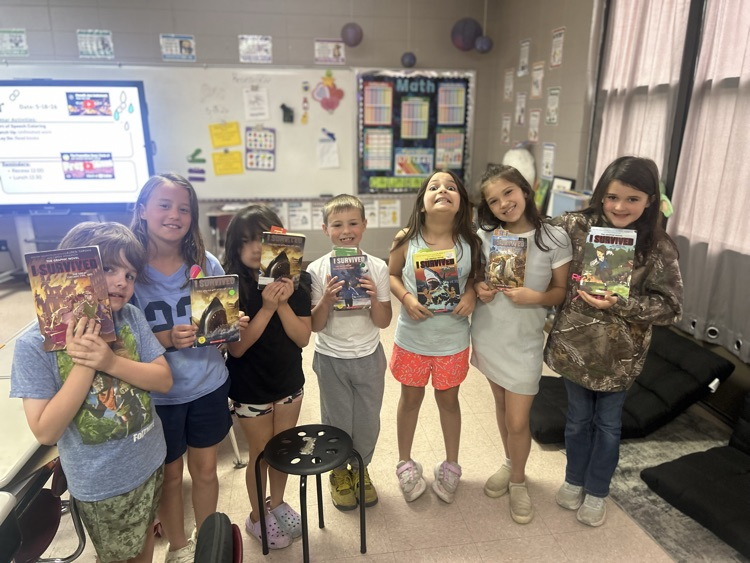 students with their books 