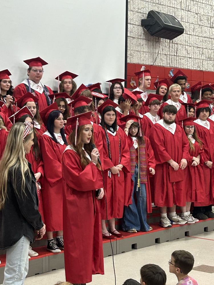 students watching seniors 