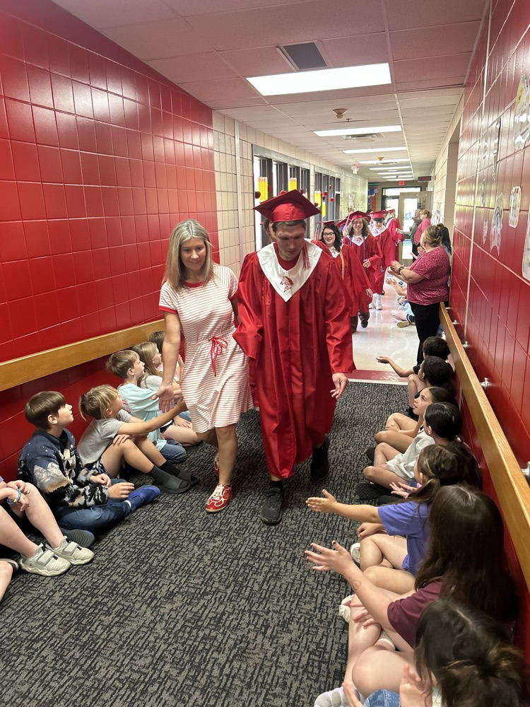 students cheering seniors on 