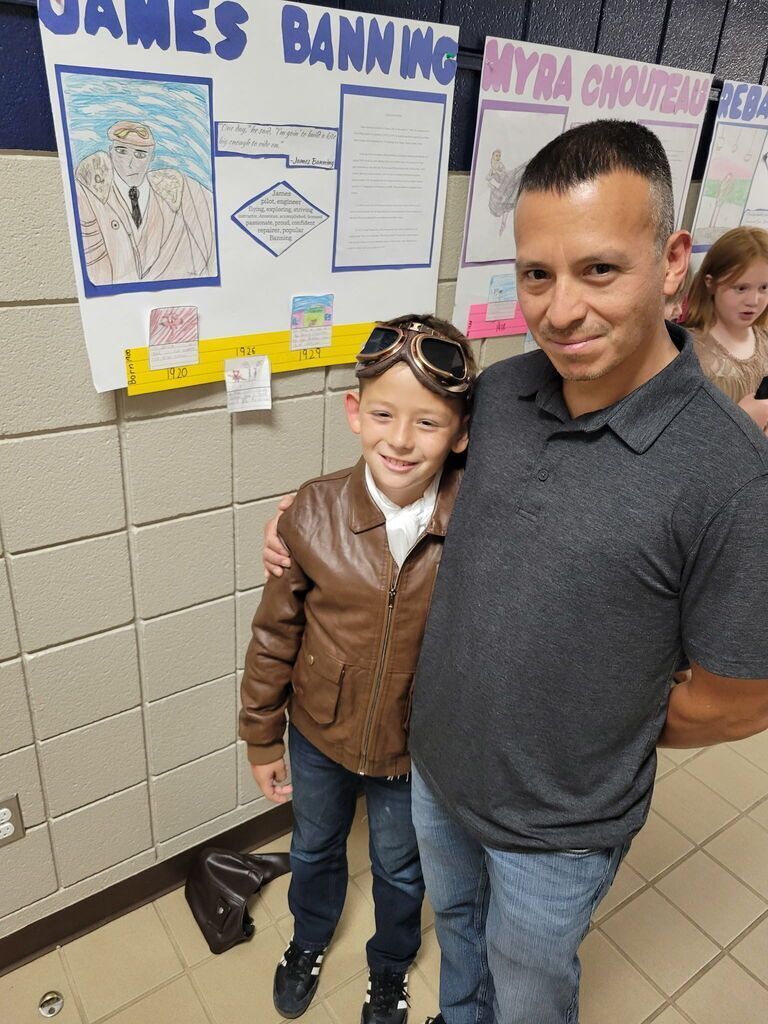 Elementary student dressed as historical figures of Oklahoma.