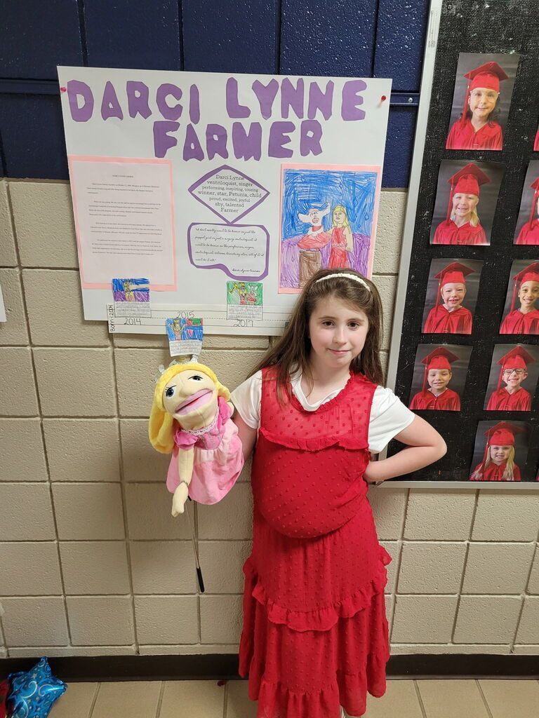 Elementary student dressed as historical figures of Oklahoma.