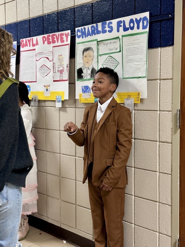 Elementary student dressed as historical figures of Oklahoma.