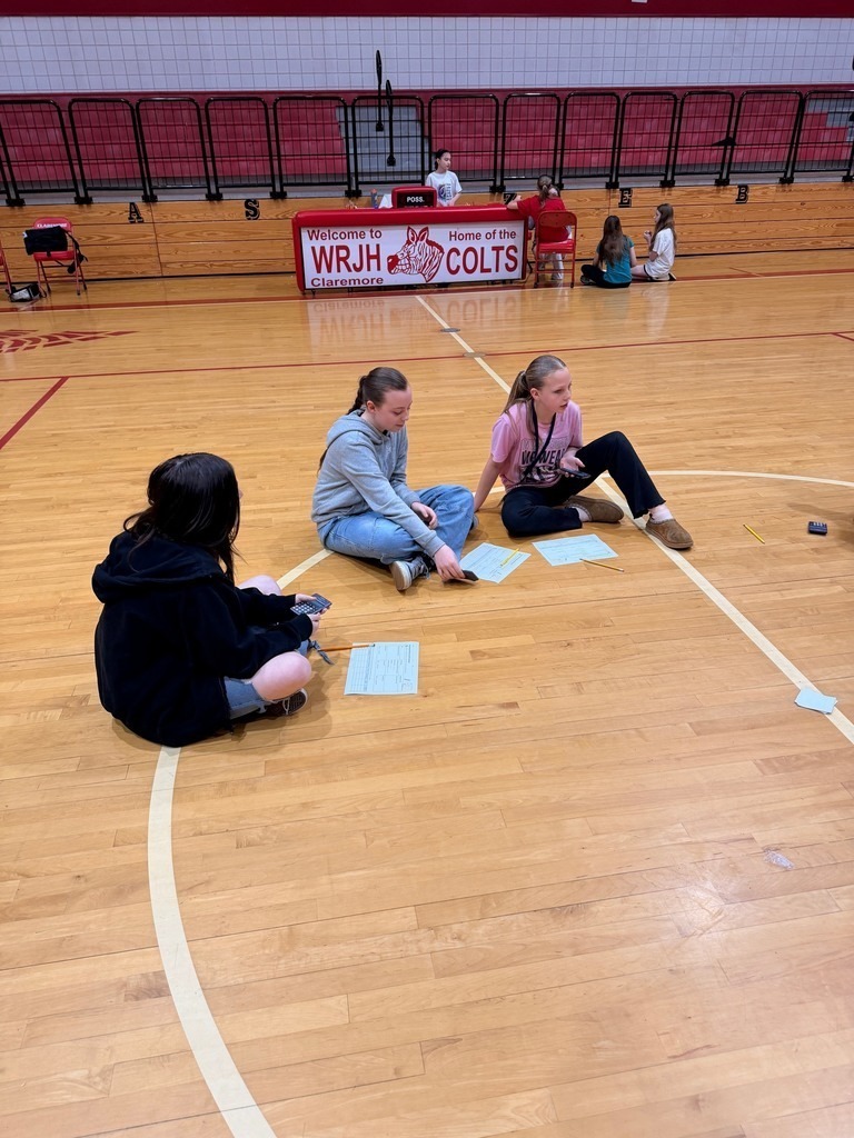 Junior high students learning about budgeting