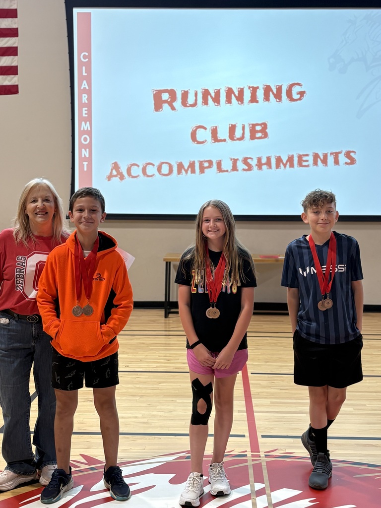 3 students who ran 50 minues smiling at their accomplishments