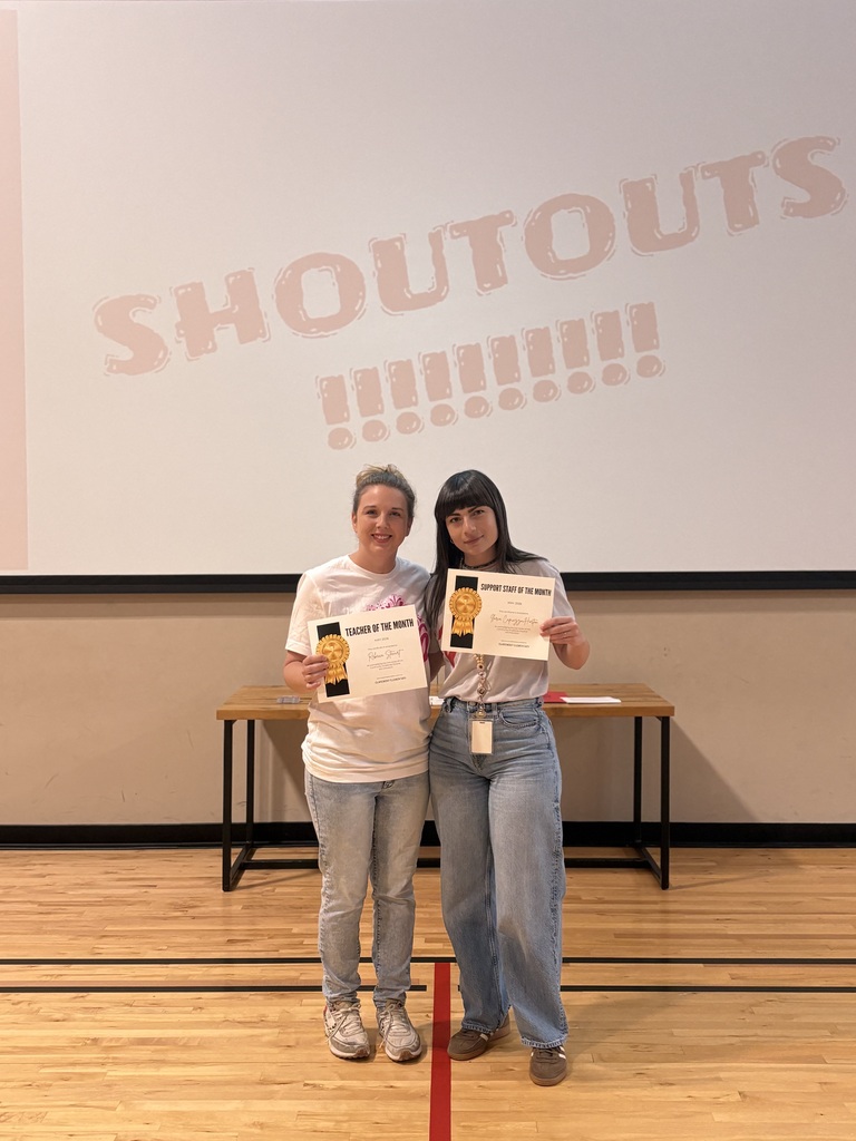 Mrs. Stanart and Mrs. Horton smiling together