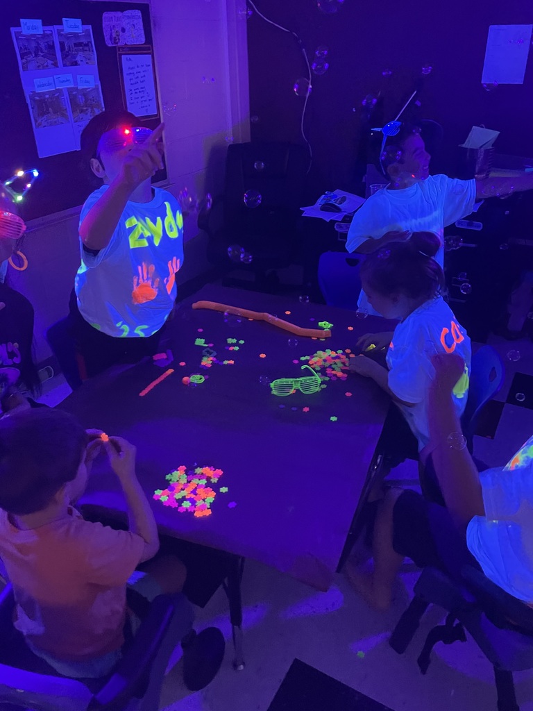 students participating in glow party