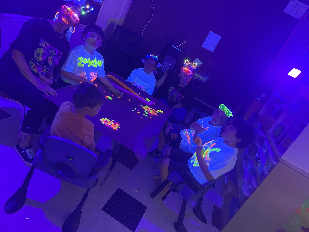 students participating in glow party
