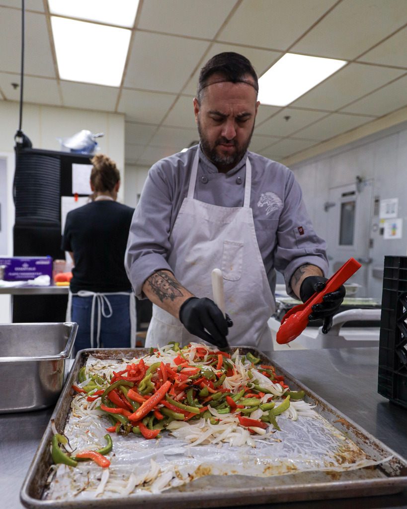 Chef Ryan cooking at the high school