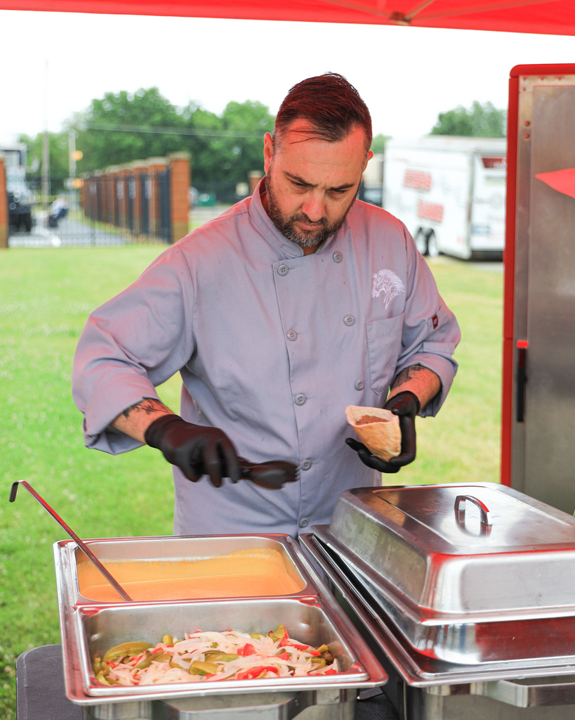 Chef Ryan serving at Powder Puff