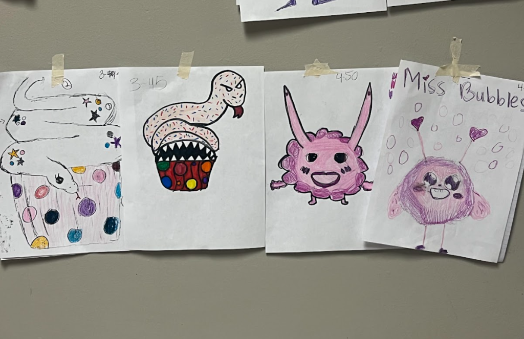 🎨👾 Creativity came to life in English I through our "Monster Projects!"  Students designed original monsters while practicing descriptive and reflective writing skills. Using imagery, simile, and metaphor, they crafted detailed descriptions of their creations. Those descriptions were then exchanged with classmates, who recreated the monsters based only on the writing provided.  The project wrapped up with students comparing the original designs to the recreations and reflecting on how effective descriptive writing can bring ideas to life. Great work by our English I students!