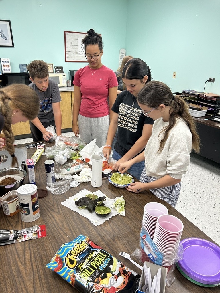 Junior high students learning to bake and cook