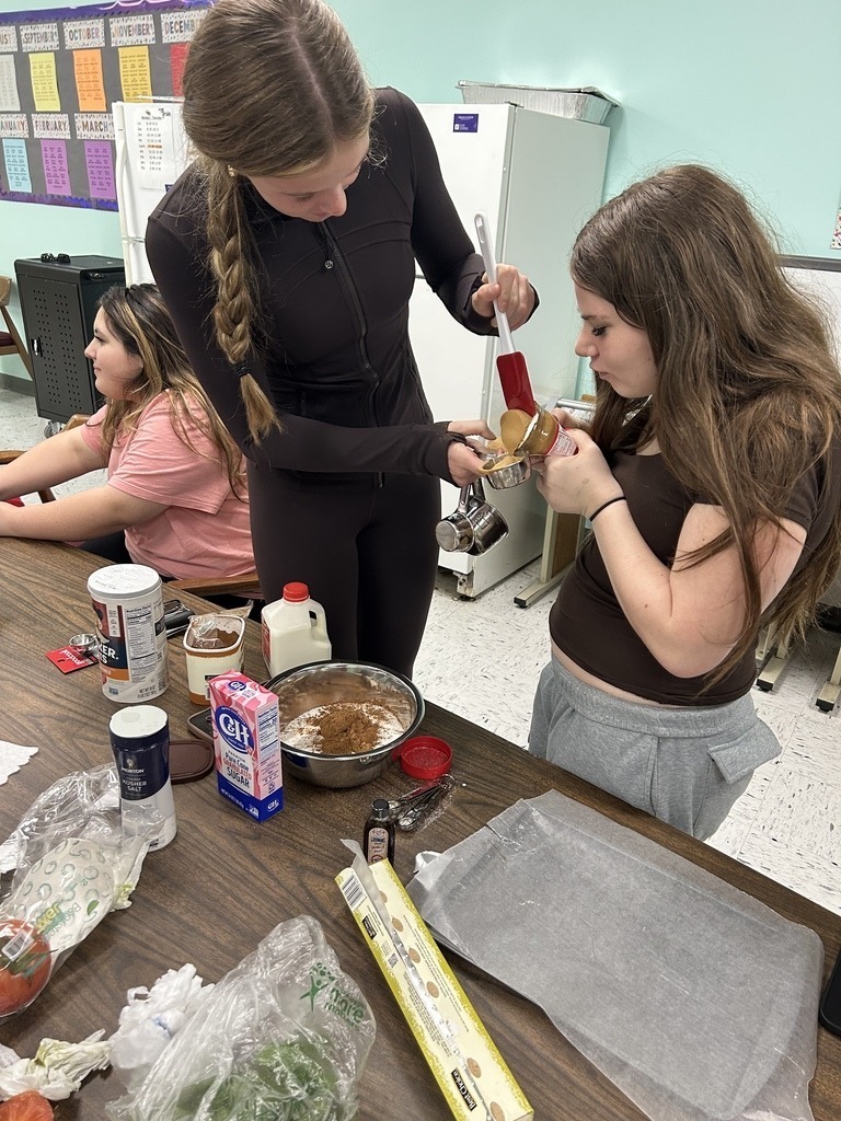 Junior high students learning to bake and cook