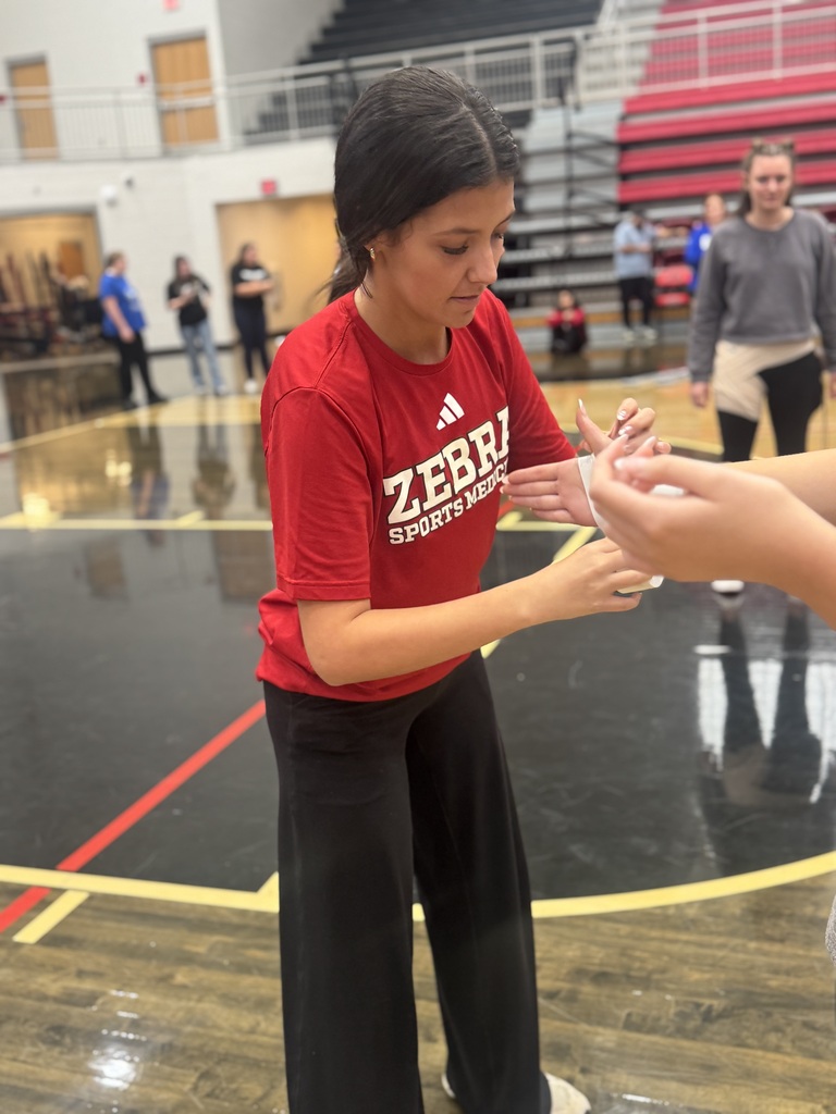 Our Athletic Training Student Aides (ATSAs) in the Sports Medicine Program had the opportunity to attend Athletic Training Student Aide Day at Westmoore High School, hosted by the Oklahoma Athletic Trainers’ Association.  Throughout the day, students sharpened and refreshed their skills in wound care, taping techniques, and emergency response situations. They also had the chance to visit with current Master of Athletic Training students from TU, OSU, and UCO to ask questions and learn more about their college experiences and career paths.  The day wrapped up with the exciting “Athletic Training Olympics,” where students were teamed with other ATSAs from across the state to compete in relay-style challenges that showcased their knowledge and skills.  Certified Athletic Trainers Karlee Davis and Dacie Sanders also enjoyed connecting and networking with fellow athletic trainers from across Oklahoma.  Most importantly, our students were able to meet and build relationships with other high school students who share the same passion for sports medicine. We are grateful for opportunities like this that allow our students to grow, learn, and network with future professionals, program directors, MAT students, and athletic trainers from across the state.  We are proud of our students and excited for what the future holds for them!