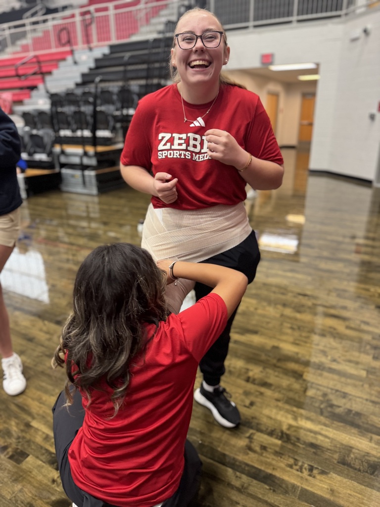 Our Athletic Training Student Aides (ATSAs) in tOur Athletic Training Student Aides (ATSAs) in the Sports Medicine Program had the opportunity to attend Athletic Training Student Aide Day at Westmoore High School, hosted by the Oklahoma Athletic Trainers’ Association.  Throughout the day, students sharpened and refreshed their skills in wound care, taping techniques, and emergency response situations. They also had the chance to visit with current Master of Athletic Training students from TU, OSU, and UCO to ask questions and learn more about their college experiences and career paths.  The day wrapped up with the exciting “Athletic Training Olympics,” where students were teamed with other ATSAs from across the state to compete in relay-style challenges that showcased their knowledge and skills.  Certified Athletic Trainers Karlee Davis and Dacie Sanders also enjoyed connecting and networking with fellow athletic trainers from across Oklahoma.  Most importantly, our students were able to meet and build relationships with other high school students who share the same passion for sports medicine. We are grateful for opportunities like this that allow our students to grow, learn, and network with future professionals, program directors, MAT students, and athletic trainers from across the state.  We are proud of our students and excited for what the future holds for them!he Sports Medicine Program had the opportunity to attend Athletic Training Student Aide Day at Westmoore High School, hosted by the Oklahoma Athletic Trainers’ Association.  Throughout the day, students sharpened and refreshed their skills in wound care, taping techniques, and emergency response situations. They also had the chance to visit with current Master of Athletic Training students from TU, OSU, and UCO to ask questions and learn more about their college experiences and career paths.  The day wrapped up with the exciting “Athletic Training Olympics,” where students were teamed with other ATSAs from across the state to compete in relay-style challenges that showcased their knowledge and skills.  Certified Athletic Trainers Karlee Davis and Dacie Sanders also enjoyed connecting and networking with fellow athletic trainers from across Oklahoma.  Most importantly, our students were able to meet and build relationships with other high school students who share the same passion for sports medicine. We are grateful for opportunities like this that allow our students to grow, learn, and network with future professionals, program directors, MAT students, and athletic trainers from across the state.  We are proud of our students and excited for what the future holds for them!