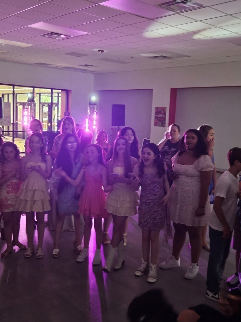 Junior high students having fun at the fiesta dance