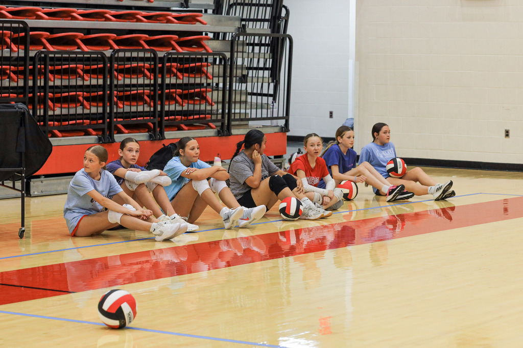 Volleyball Campers working on drills and learning new skills.